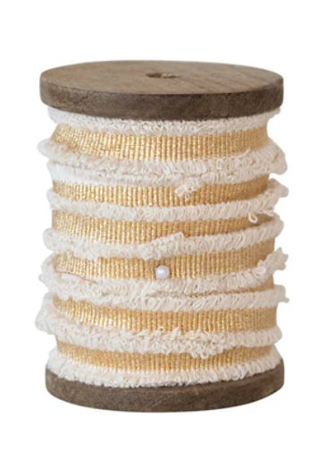 Wooden spool with gold metallic ribbon with cotton fringe edge