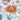 Decorative floral pattern with red flowers and blue leaves on a white background
