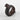 Bronze bird-shaped napkin ring on a white background