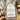 Packaged mushroom fettuccine with Valente Market label surrounded by mushrooms on a textured fabric background