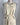 Patterned apron on a mannequin against a plain background