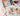 Floral painting kit with completed artwork, paintbrushes, and supplies on a light surface.