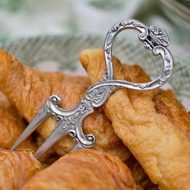 Arte Italica & Crown Linen Designs - Vintage Bread Fork Shown with croissants
