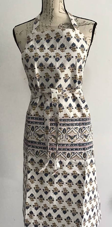 Patterned apron on a mannequin against a white background