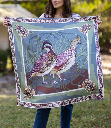 Model is holding the Quail Pair scarf open