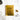 Gold book titled 'Bubbly' on a marble surface with champagne bottle and glasses.