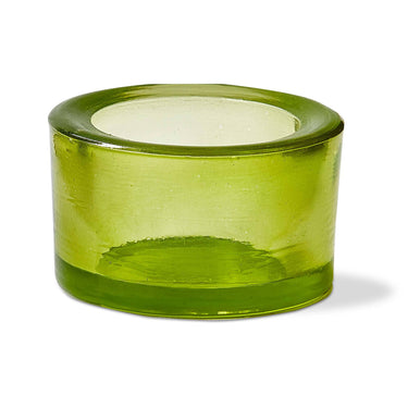 A blue chunky glass tealight holder crafted with traditional blown glass techniques.