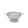Metallic colander on a white background