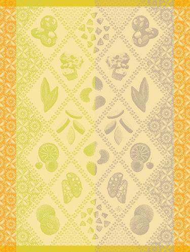 Patterned fabric with green and gray designs on a yellow background