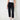 Black jogger pant with beige top and sneakers against a white wall
