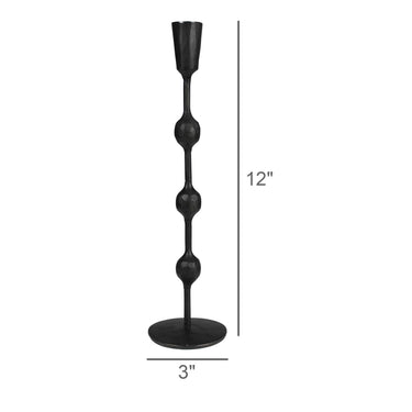 Black metal candlestick holder with a tiered stem and round base, shown on a white background with dimension labels indicating 12 inches tall and 3 inches wide.